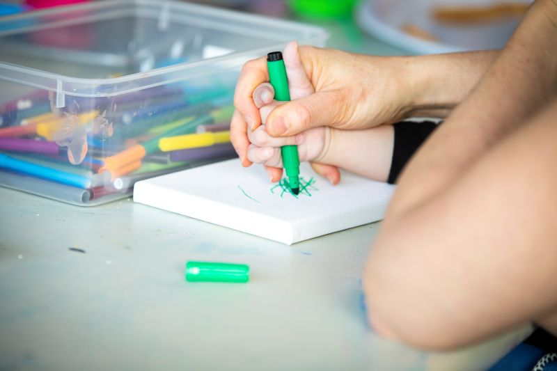 Parent and child drawing together Hummingbird House